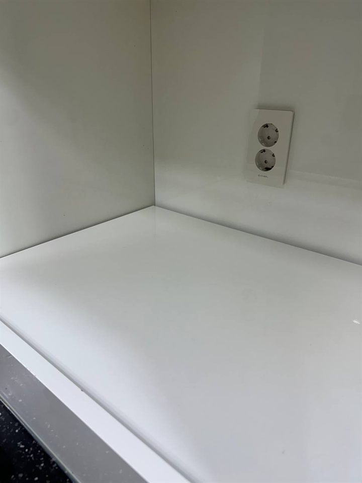 Cabinet shelf after CLEANX cleaning