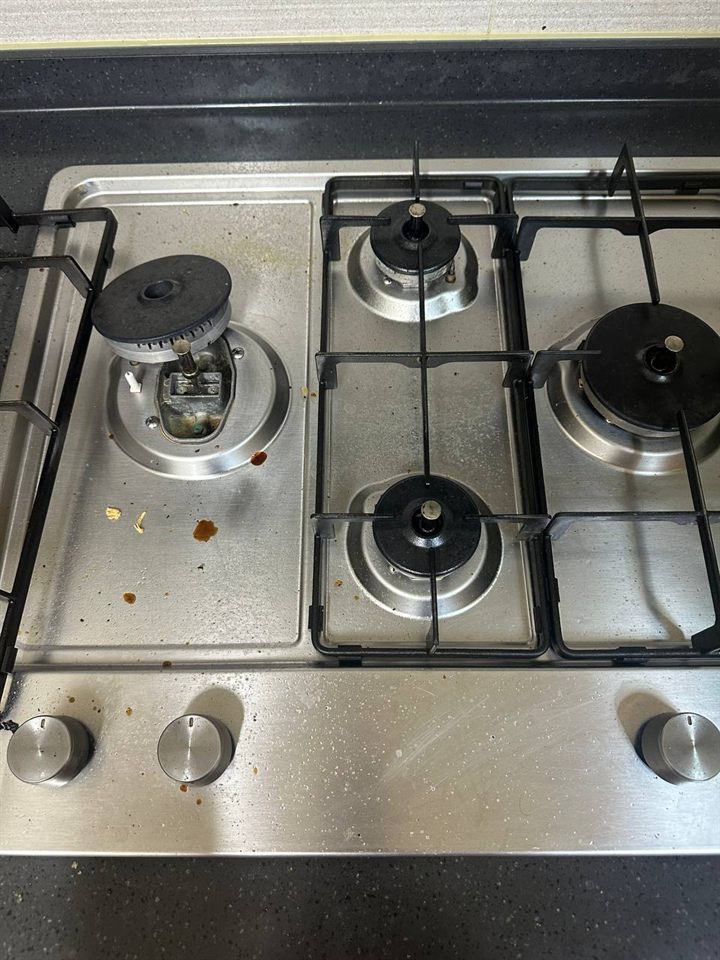 Gas cooktop before CLEANX cleaning