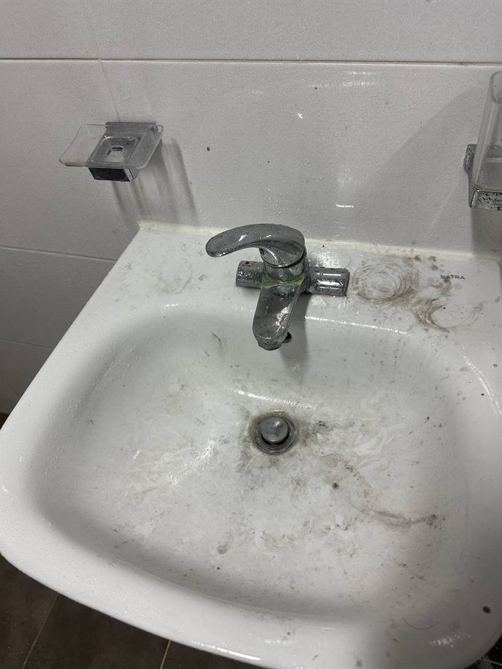 Bathroom sink before CLEANX cleaning