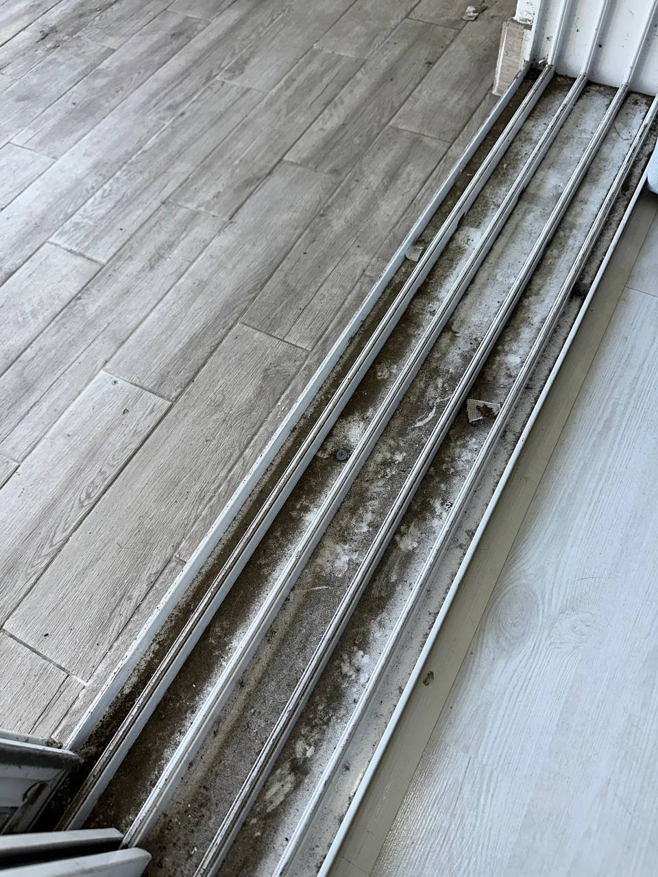 Sliding door tracks before CLEANX cleaning